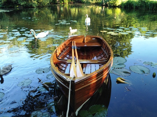 Rowing a boat on a River.jpg